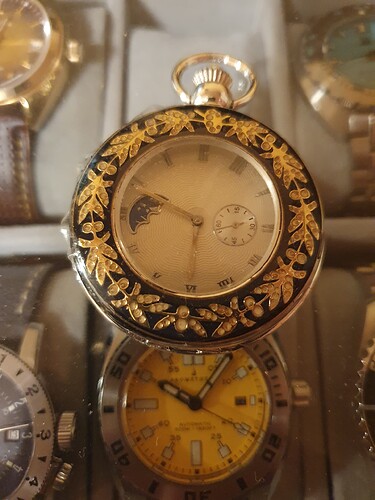 zakhorloge met maanfase