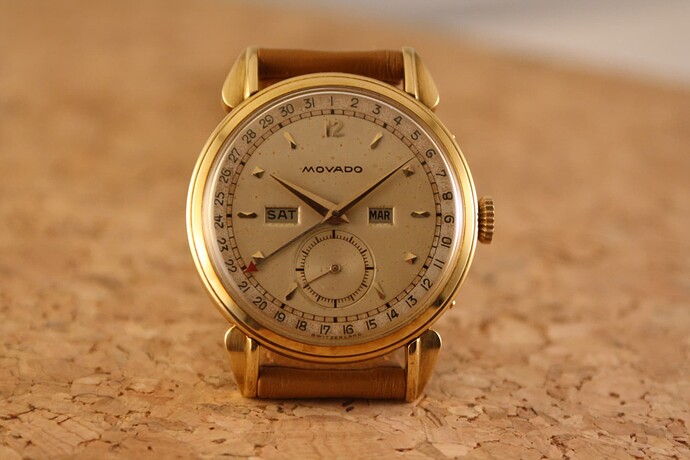 movado-18k-calendar-wristwatch-stepped-case8