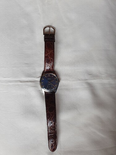 Monvis met Longines bandje