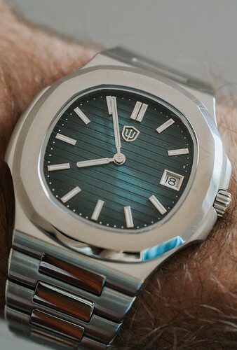 watchdives-wd0013-nautilus-homage-v0-rf2zg4ncwdxf1