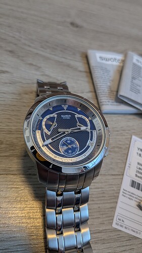 スウォッチ レトログラード YRS400G DARK STEEL Swatch Dark Steel YRS400G Price as of December 2025 | WatchCharts