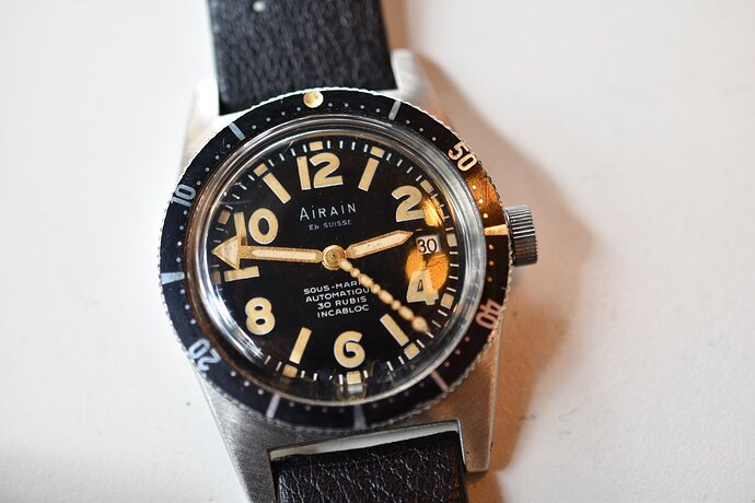 Airain-Sous-Marine-Re-edition-vintage-Sous-Marine-watch-with-DNA-strand-seconds-hand